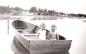 Bill Nicoll and Friend in Row Boat