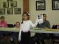 Onestie Alexander (grade 2, age 7) presenting her illustrated story on snowshoes