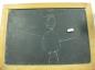 Trey Hrabarchuk used the chalk and slate to draw a picture of a person