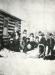 P2010.9.12: Cassia McTavish with students outside first schoolhouse in winter with toboggan, c. 1914