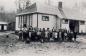 P993.34.84: Students gathered in front of the second McMurray Public School, circa 1927