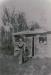 P2011.40.11: Boys playing baseball in front of the old school porch, circa 1927