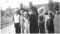 P2008.207.1: Father Lesage and the Bishop with five children, 1947