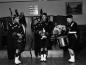 Two pipers and a drummer in Highland dress play with Pickersgill's orchestra.