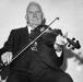 90 year old C. MacMillan playing the violin