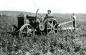 Alfred and Ed Buelow Plowing with Case Tractor