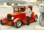 Mary Ross admiring a hotrod car