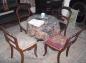 Table and four chairs located in the parlour