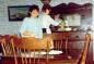 Joan Ivany and Pam Fowlow dusting the furniture at the Hiscock House.