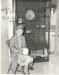 ''Alice Hagen with a cabinet containing her work''  (no date), DeWolfe's Studio, Bridgewater, NS