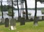 A view of Mahone Bay harbour, Oakland, and stones in the Bayview Cemetery.