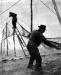 A local fisherman removes a twist in the net.