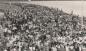 Crowds march across the Canso Causeway after the official opening ceremony.