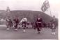 Drum Major, Al Skinner of the Inverness Pipe band at head of parade in white jacket