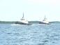 Tugs sailing up the Strait of Canso