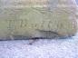 Hand carved name (Battye) on old boot scraper.