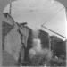 Blasting a quarry face, with debris in the air