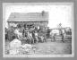 Group of quarrymen infront of a ''sloven'' A heavy duty wagon for moving rock.