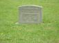 A grave stone made of Wallace sandstone.