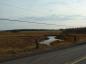 Fox Creek viewing south towards Fox Harbour; dykes on right