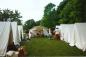 Loyalist encampment, reinactors with tents and camp followers