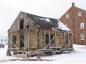 A view of the Doucet House from behind the building in the weeks before it is to be restored. 