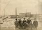 A group of employees standing in front of the Albert Manufacturing Company Mill in Hillsborough.