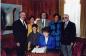 Erminie Cohen is shown with her family as she signs in as a member of the Canadian Senate