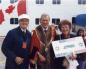 Simon and Kay Levine with Mayor Tom Higgins - greeting cruise ship passengers