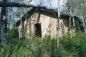 West view of adobe house