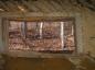 Window frame in adobe house  with potato print patterns.