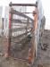 Gate for cattle chute made of combine rub bars and metal.