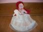Homemade dolls were made of scraps of cloth. Yarn doll  and Red Riding Hood doll.