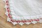 Crocheted lace on flour sack tablecloth