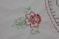 Detail of embroidery on flour sack tablecloth