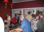 Crowd at the opening for ''CROSSINGS: a portrait of the Chinese Community of Moose Jaw''