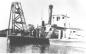 The Pas Lumber Company's 'Alice Mattes' at dock with pile driver.