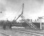 The first tower to be raised on the Manitoba Power Commission system.  