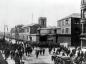 Workers leaving the shipyard by the main entrance