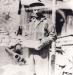 David Sloan holding gold brick from Pioneer Mine 1930