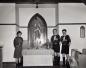 Scouts on church alter.