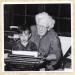 HUBERT EVANS WITH HIS TRADEMARK UNDERWOOD TYPEWRITER WITH HIS GREAT GRANDSON, COREY.