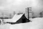 Kilby Cow Barn with First Nations People Helping to Clear Snow from Roof