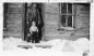 Goodvin, John and grandson in front of one of the first homes built in town by Dr. Fredette.