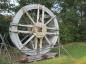 The 1982 restoration wheel now resides in the garden.