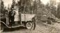 Charlie Rouleau and Albert Thomas with truck load of railroad ties