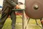 Wood cutting demonstration at an engine show.