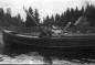 Dean Huble, the last child of Annie and Al Huble, rowing a boat at Summit Lake in 1943. 