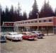 Cars Parked in Front of the Outdoor Swimming Pool at Skoglund's Lakelse Hotsprings Resort.
