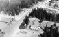 An aerial view of the west end of 5th Ave showing the Yellowhead Motel and the Alpine Restaurant